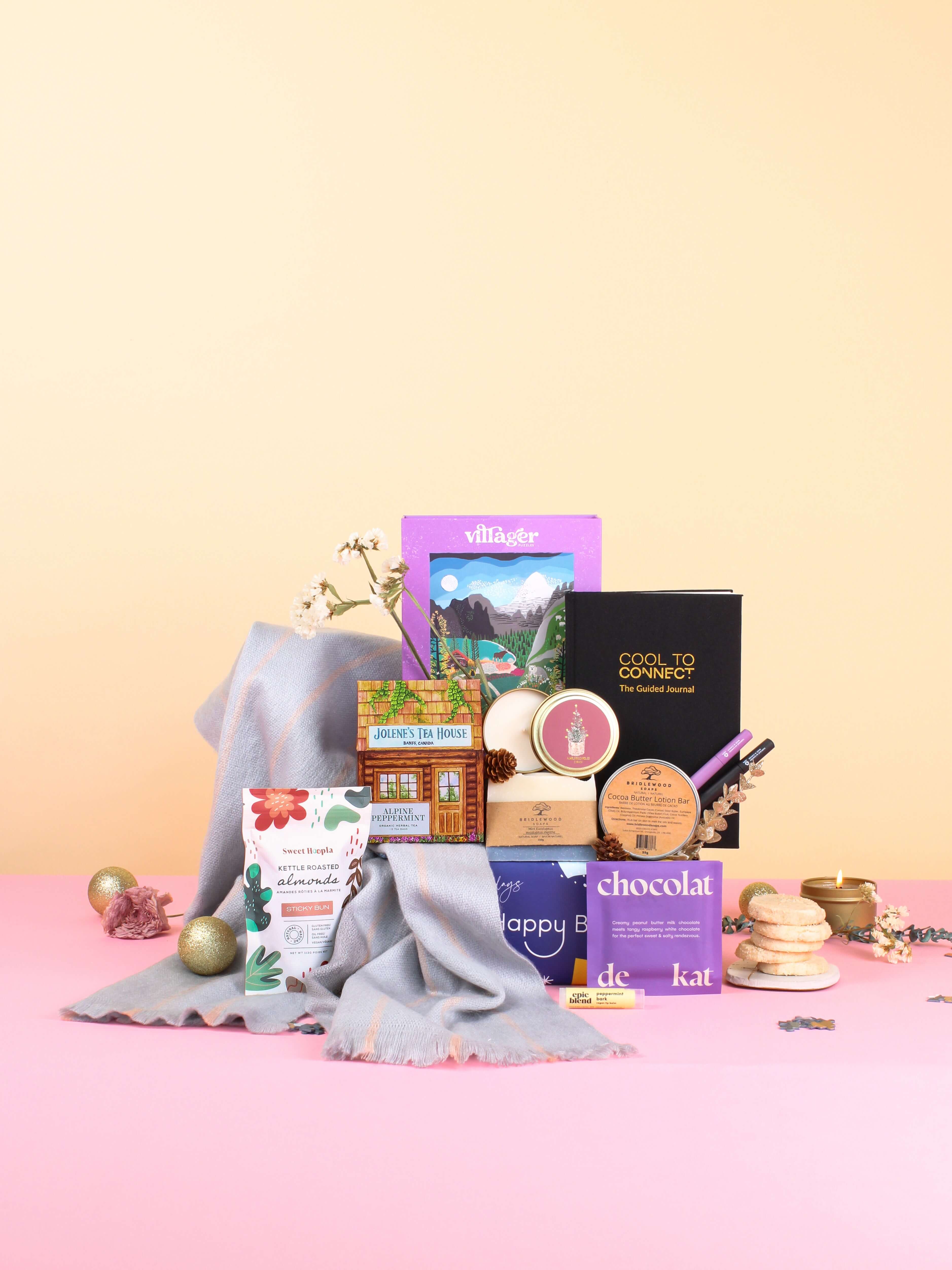 women gift box canada with tea, scarf, journal, puzzle, and self-care items