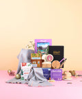 women gift box canada with tea, scarf, journal, puzzle, and self-care items