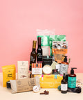 self care gift box canada with snacks, candles, skincare, and cozy items